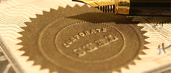 picture of an embossed gold foil seal