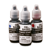 picture of 3 plastic bottles of oil based stamp ink